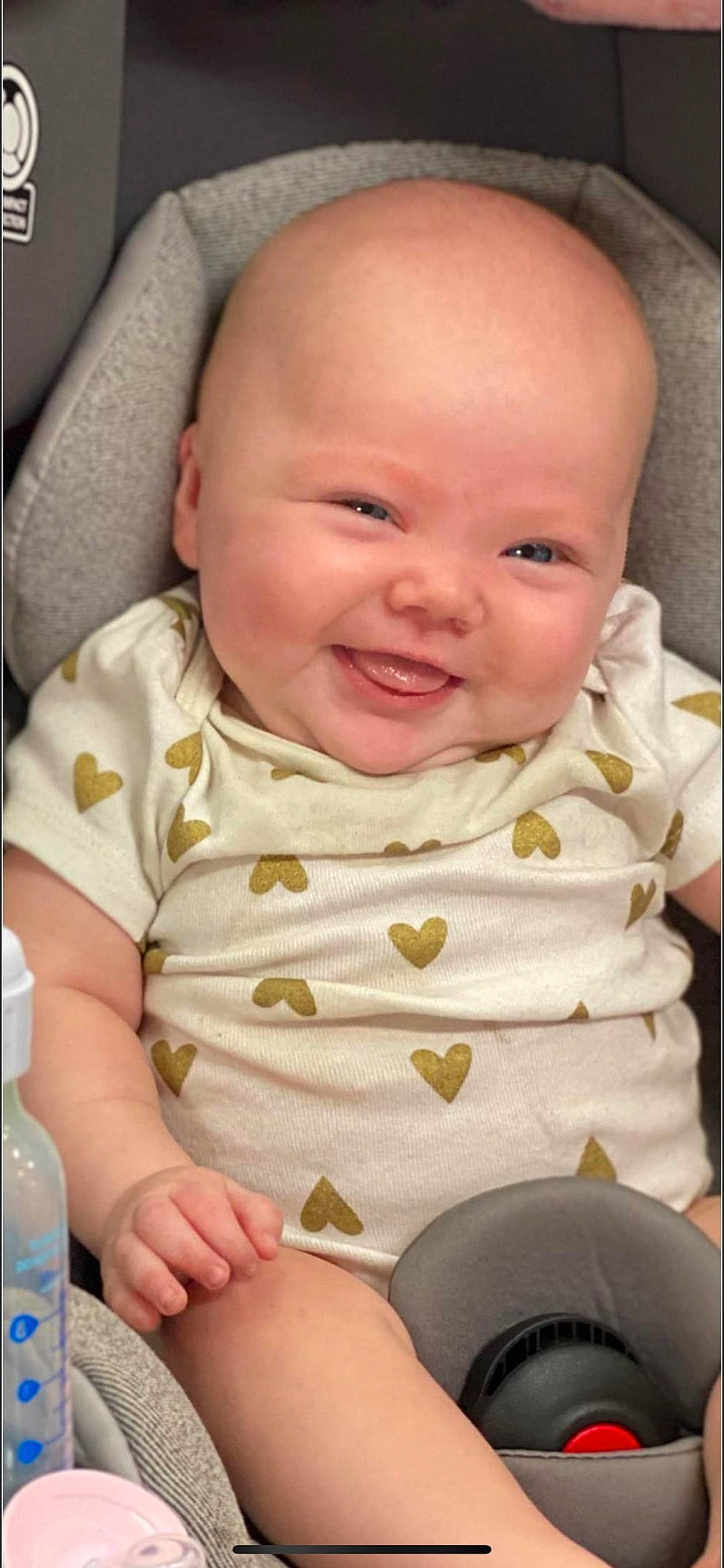 Kyah joined the competition — help win amazing prizes! baby_toddler_clothing, cheek, child, chin, comfort, ear, eye, eyebrow, facial_expression, forehead, happy, iris, lip, mouth, nose, person, plastic_bottle, product, skin, smile