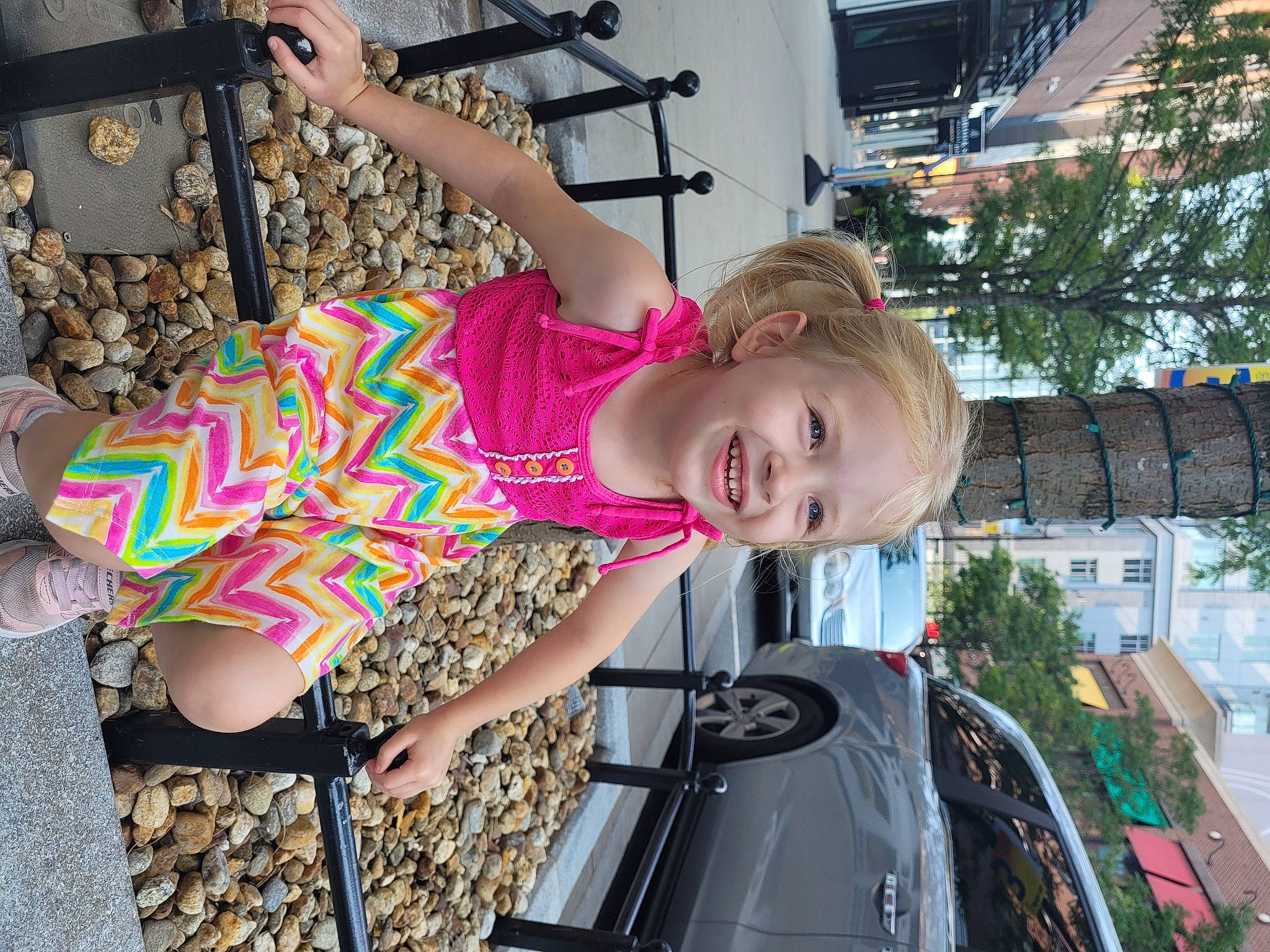 Megan joined the competition — help win amazing prizes! automotive_exterior, child, city, fun, happy, human_leg, joy, leisure, motor_vehicle, person, pink, public_space, recreation, sandal, smile, summer, t_shirt, thigh, toddler, travel