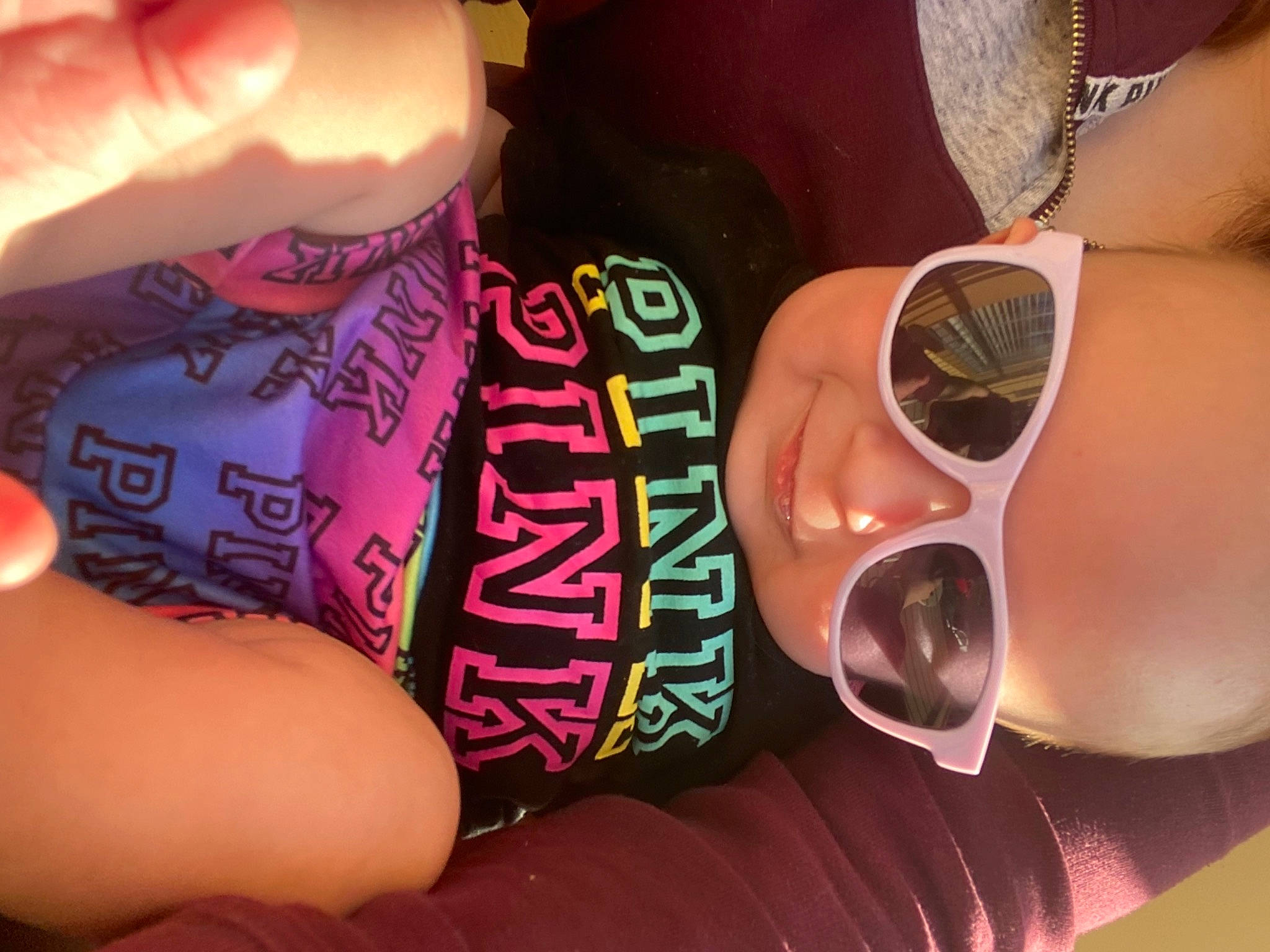 Kamilla is registered to the contest to win money with this photo: cool, drink, drinkware, eyewear, finger, glasses, goggles, hand, human_body, leg, material_property, muscle, nail, person, pink, product, sunglasses, thigh, thumb, tints_and_shades