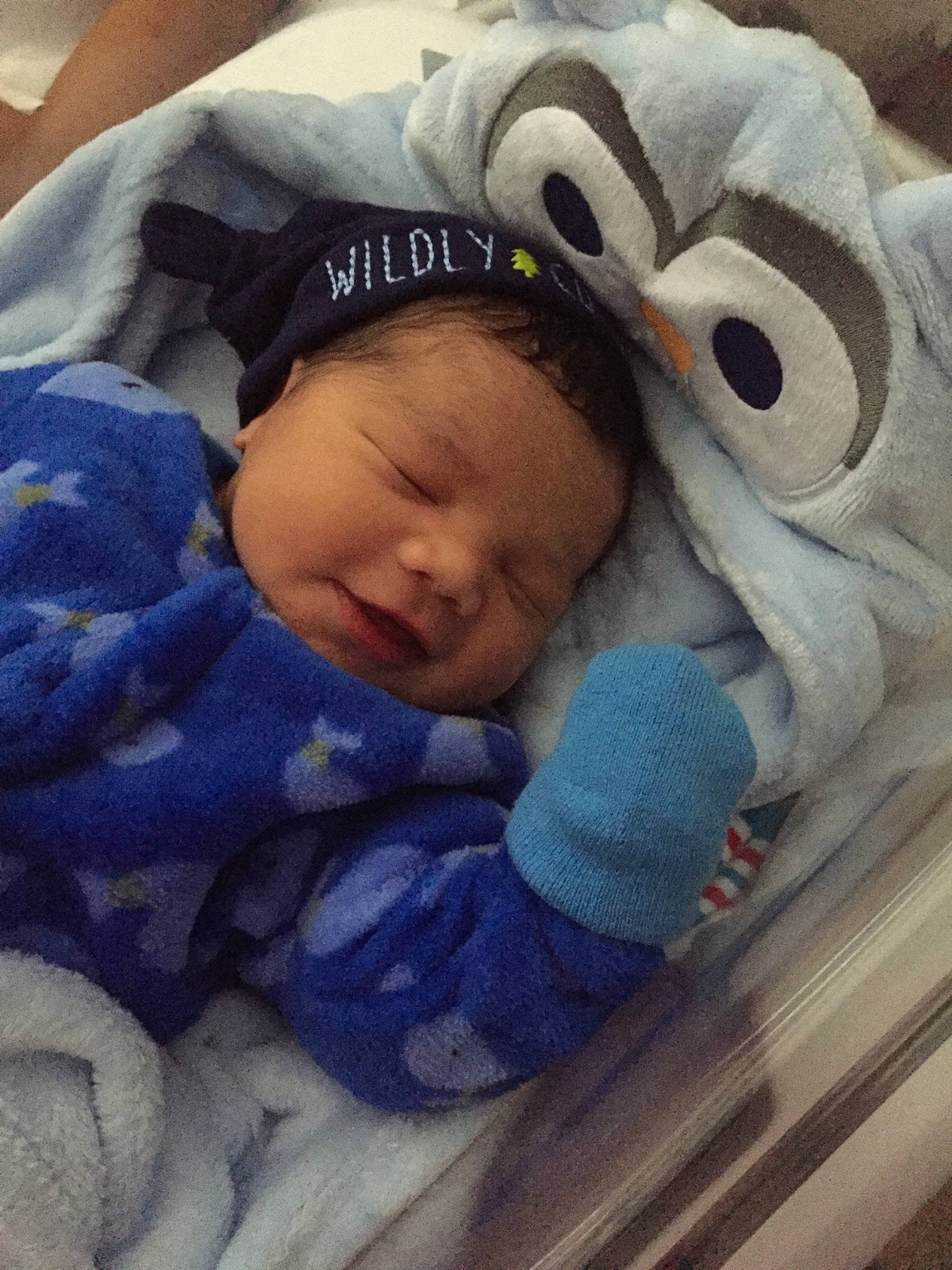 Nyham is registered to the contest to win money with this photo: blue, child, eye, infant, material, nap, person, plush, product, skin, sleep, stuffed_toy, textile, toddler