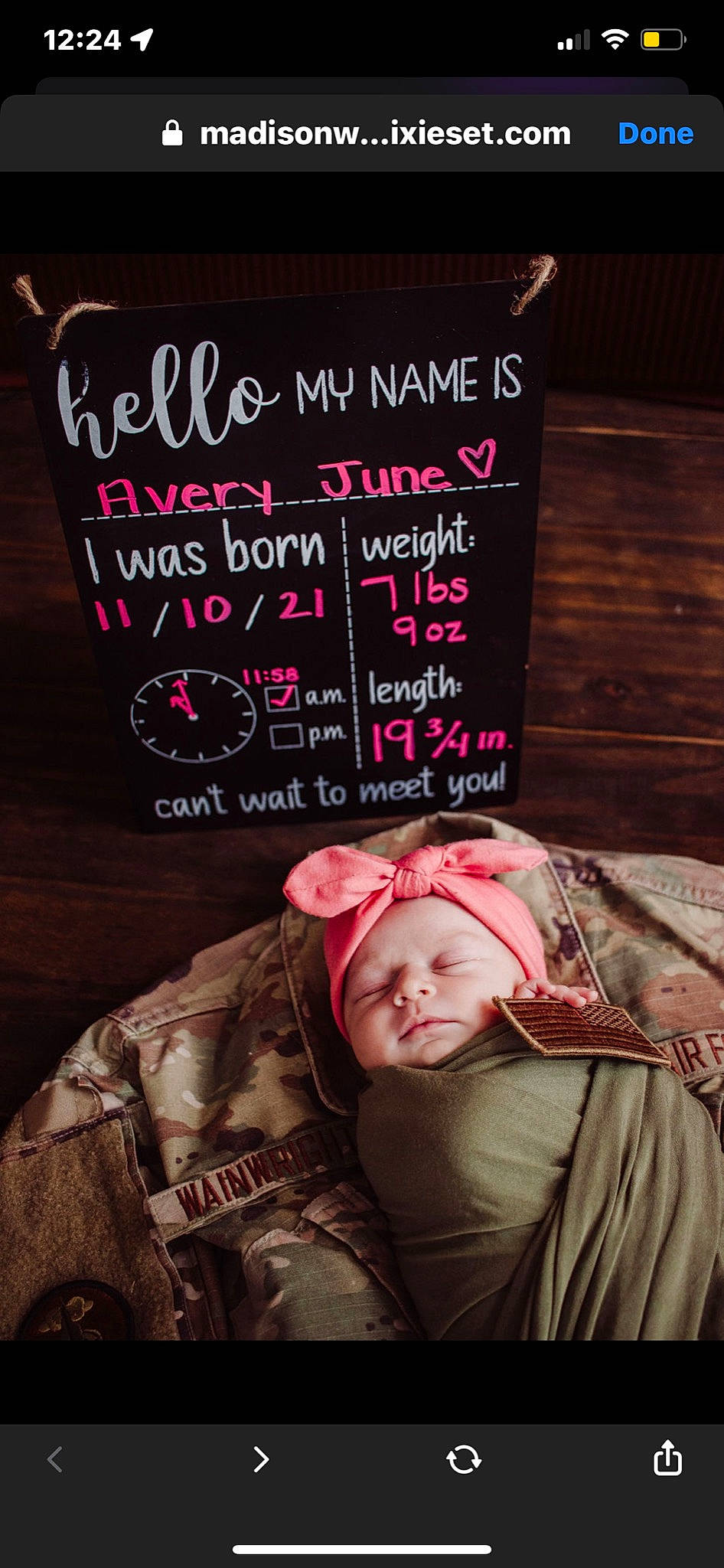 Avery is registered to the contest to win money with this photo: baby, blackboard, cap, chalk, comfort, darkness, flash_photography, font, handwriting, headwear, hood, hoodie, jacket, magenta, person, photo_caption, pink, room, sitting, slate