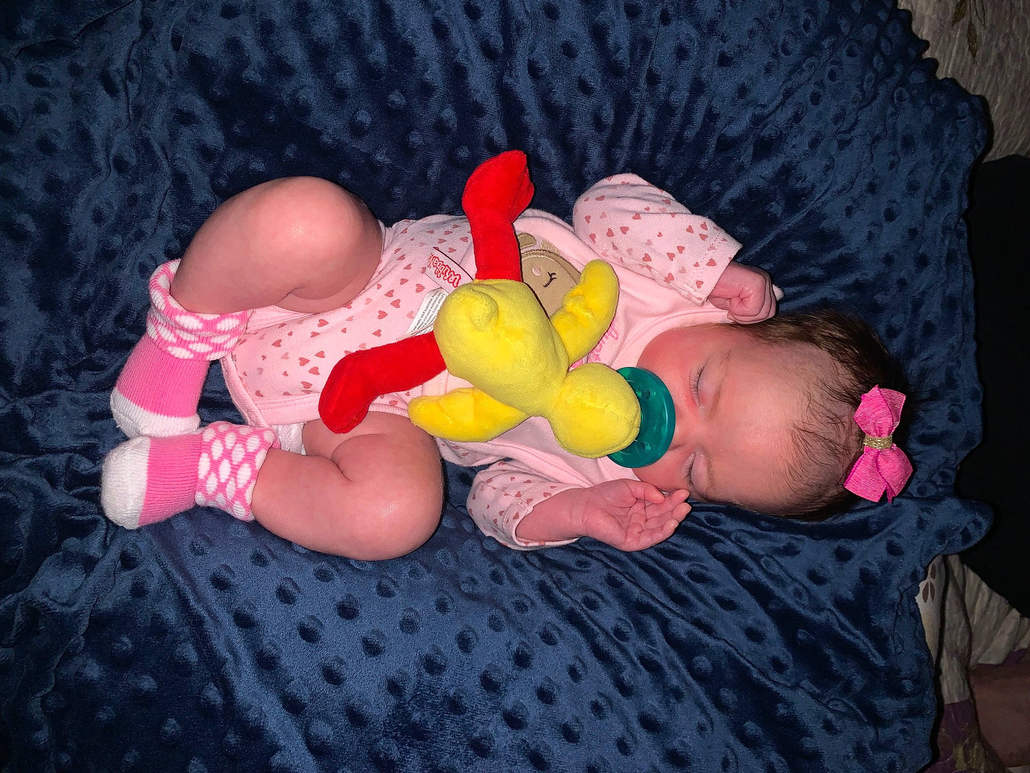 Brynlee is registered to the contest to win money with this photo: baby, barefoot, child, comfort, finger, foot, fun, gesture, hand, happy, human_body, human_leg, lap, leg, person, pink, sitting, stomach, textile, thigh