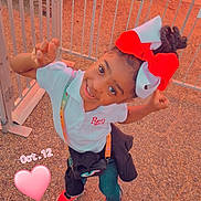 Zereniti joined the competition — help win amazing prizes! bow, casual_clothing, child, crossbody_bag, cute, daylight, fence, girl, gravel, happy, metal_gate, no_entrance_sign, outdoor, playful, portrait, pose, red_bow, smiling, sneakers, white_bow