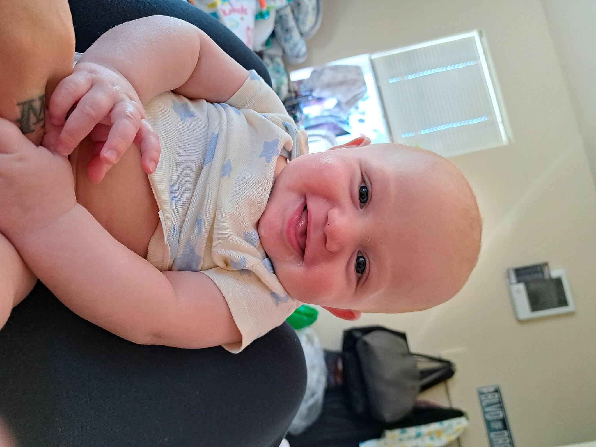 Liam joined the competition — help win amazing prizes! abdomen, arm, baby, baby_products, baby_toddler_clothing, cheek, chest, child, comfort, finger, fun, gesture, happy, hat, joy, mouth, person, sitting, skin, smile