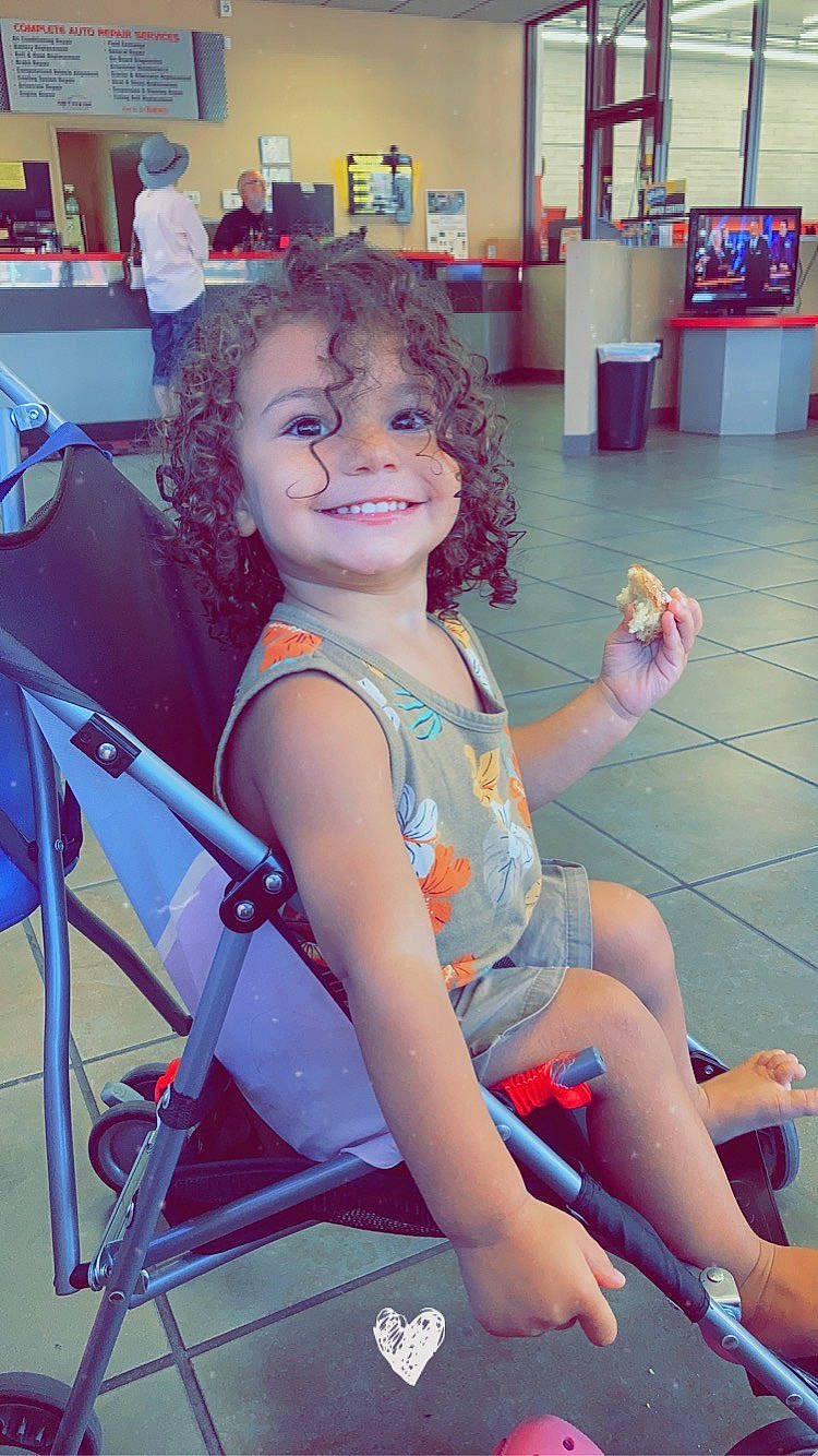 Kannon is registered to the contest to win money with this photo: chair, child, electric_blue, foot, fun, hairstyle, happy, human_leg, joy, knee, lap, leisure, long_hair, person, photograph, recreation, sandal, sitting, skin, smile