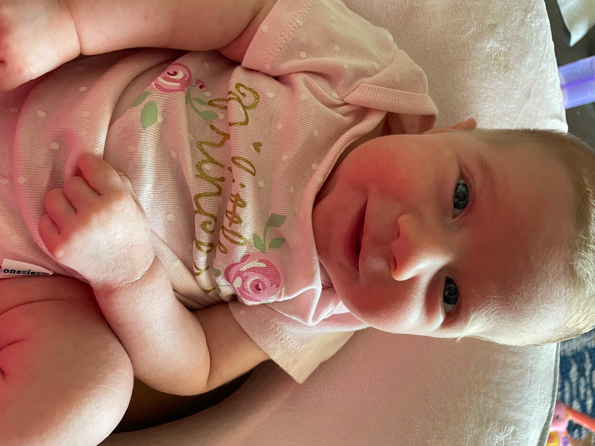 Lexie joined the competition — help win amazing prizes! arm, baby, baby_toddler_clothing, cheek, chin, facial_expression, finger, gesture, hand, happy, lip, mammal, mouth, muscle, nose, person, pink, product, skin, smile