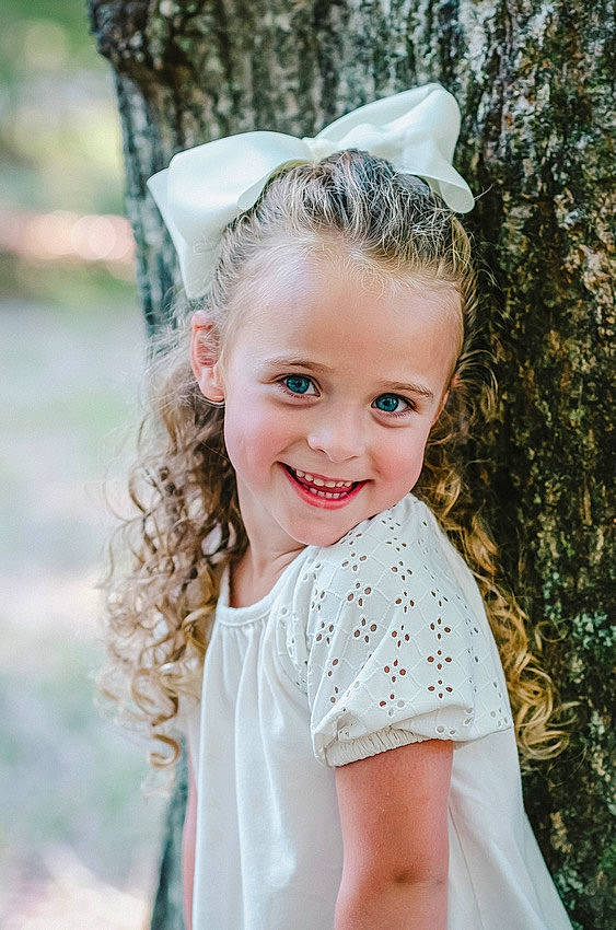 Maisyn is registered to the contest to win money with this photo: blond, bridal_accessory, bridal_clothing, dress, face, flash_photography, formal_wear, fun, gown, grass, happy, headpiece, human_body, iris, jewellery, joy, long_hair, neck, person, smile