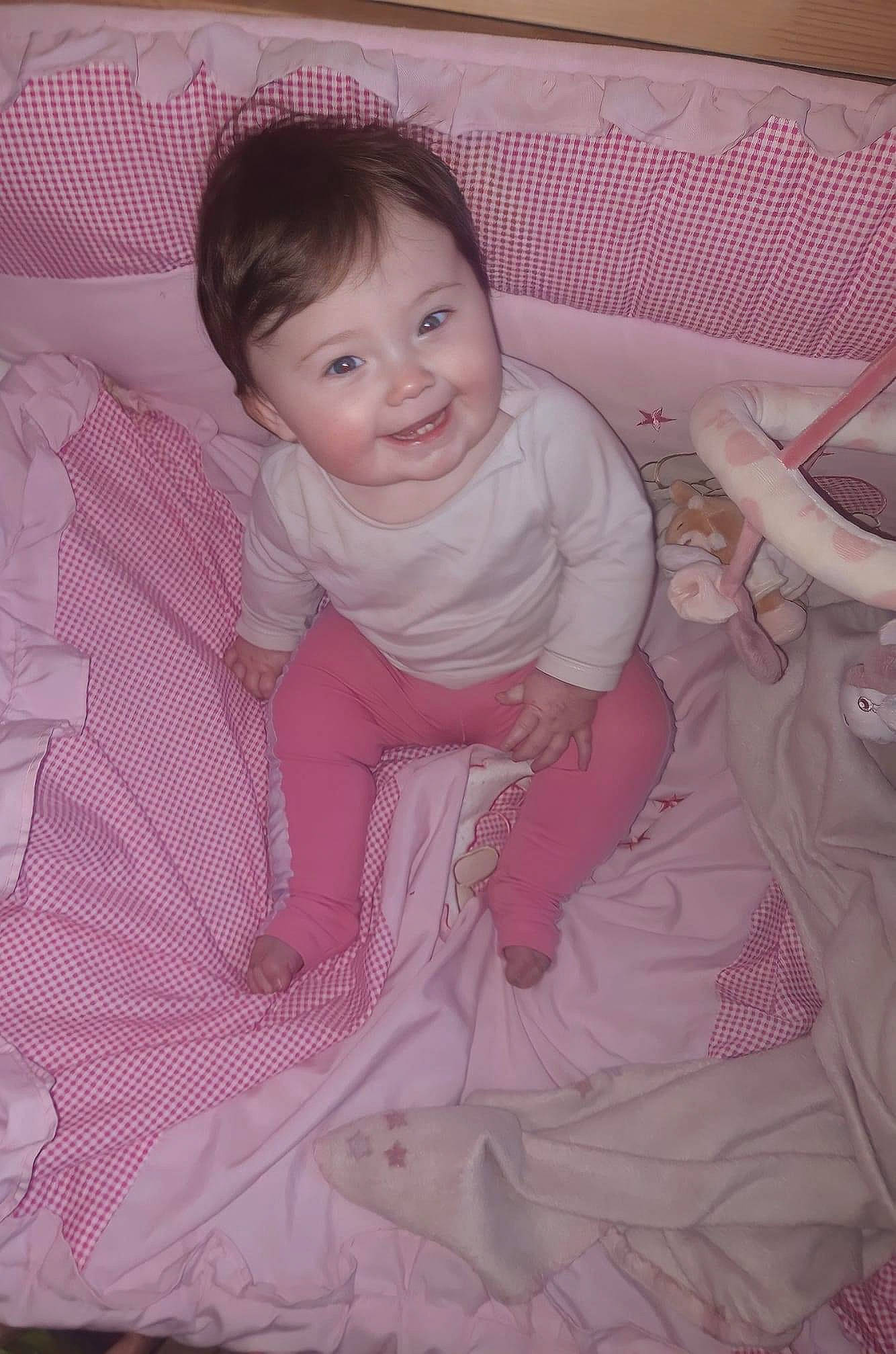 Mïa a rejoint le concours — aidez-le/la à gagner de superbes lots ! arm, baby_toddler_clothing, cheek, chin, comfort, dress, eye, eyebrow, face, hair, head, human_body, joy, lip, nose, outerwear, person, purple, skin, sleeve