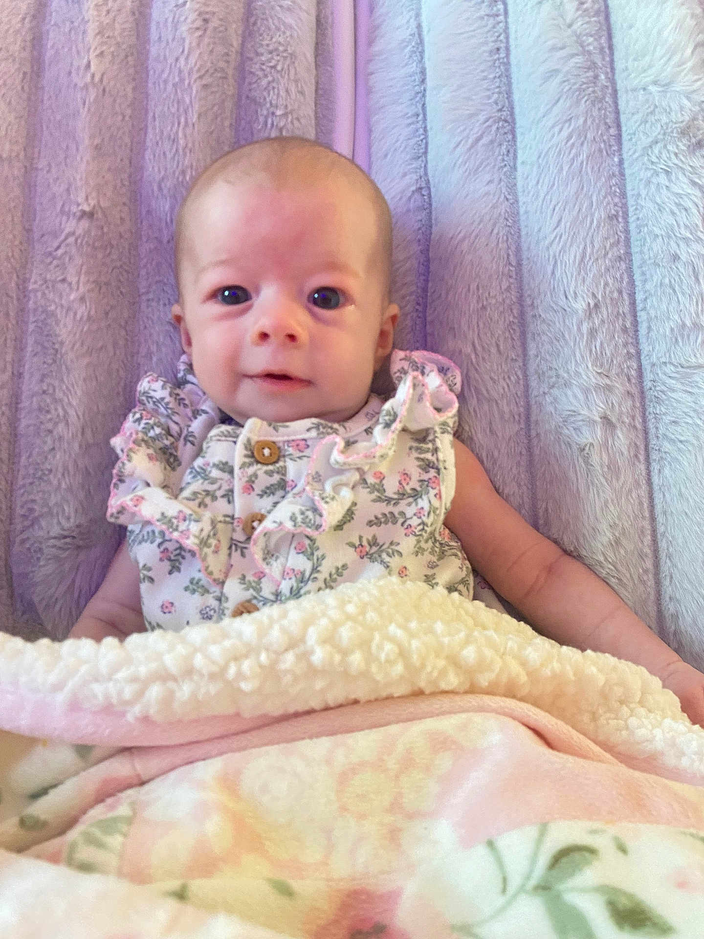 November joined the competition — help win amazing prizes! baby, infant, blanket, floral, clothing, cute, face, head, person, portrait, soft, texture, pastel, sleepwear, young, child, sleeping_area, comfort, indoor, rest