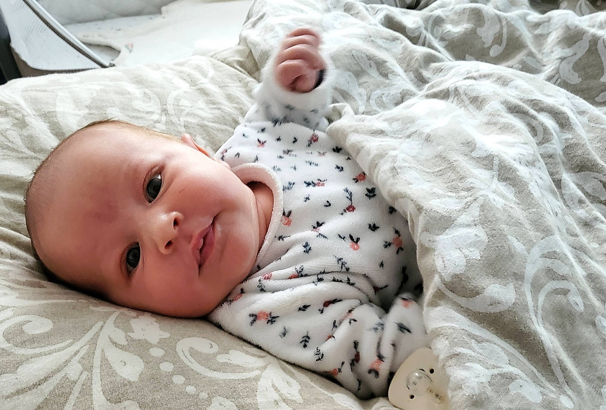 Maddie participe au concours pour gagner de l'argent avec cette photo : baby, baby_toddler_clothing, bedding, child, comfort, eye, grass, happy, linens, pattern, person, portrait_photography, room, sitting, skin, sleeve, smile, toddler, wood