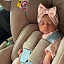 baby, infant, car_seat, sleeping, pink, headband, bow, floral, clothing, seatbelt, child, cute, newborn, car, safety, pajamas, soft, peaceful, toddler, resting