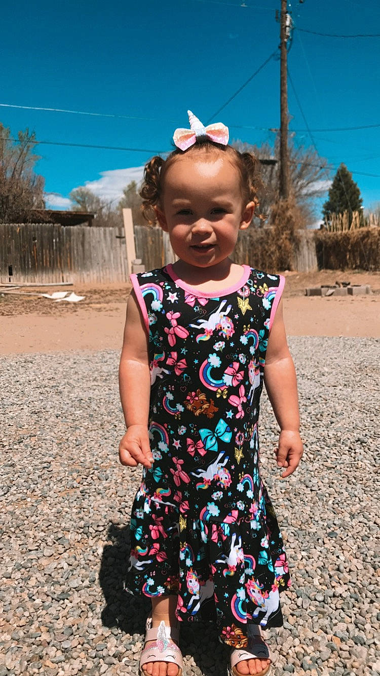 Violette is registered to the contest to win money with this photo: day_dress, dress, facial_expression, grass, hair, hairstyle, happy, human_body, neck, one_piece_garment, person, pink, plant, shoulder, skin, sky, sleeve, smile, street_fashion, tree