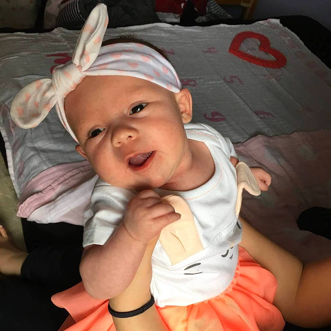 Violette joined the competition — help win amazing prizes! arm, baby, cheek, child, ear, face, facial_expression, finger, forehead, gesture, hand, head, headgear, headwear, laugh, mouth, nose, person, skin, smile
