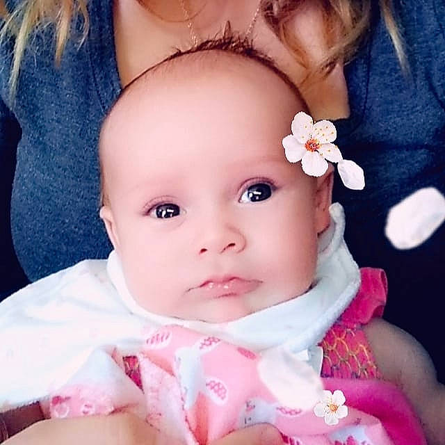 Violette is registered to the contest to win money with this photo: baby, beauty, brown_hair, cheek, child, child_model, ear, eye, face, hair_accessory, happy, head, iris, lip, nose, person, photography, pink, skin, smile