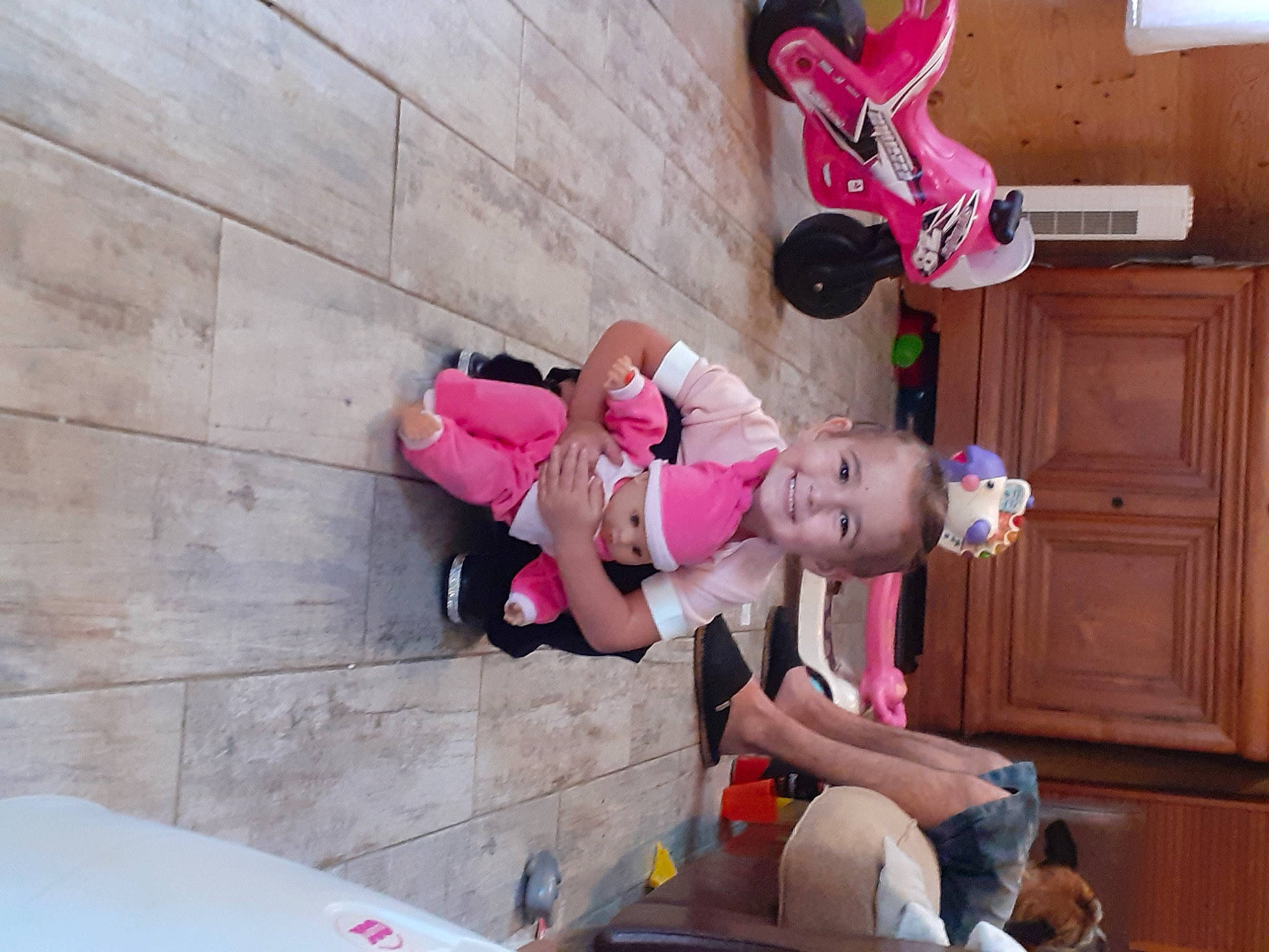 Eleanor participe au concours pour gagner de l'argent avec cette photo : baby, carmine, child, door, event, fun, hat, headwear, joy, leisure, magenta, person, pink, play, purple, recreation, red, sandal, shoe, shorts