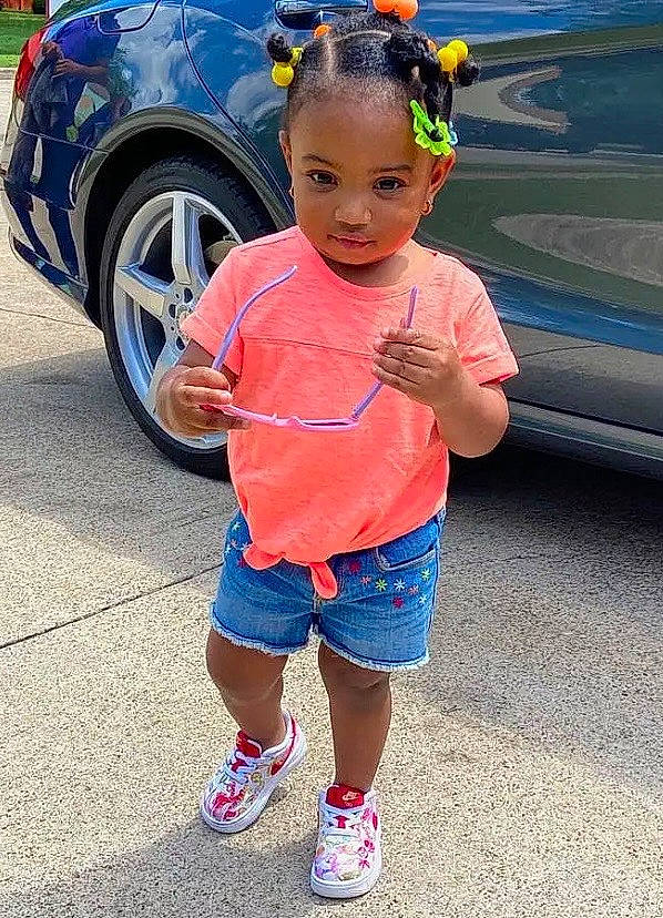 Jacee is registered to the contest to win money with this photo: auto_part, baby, blue, car, child, cool, electric_blue, family_car, fashion_accessory, person, plant, play, summer, toddler, vacation, vehicle, vehicle_door