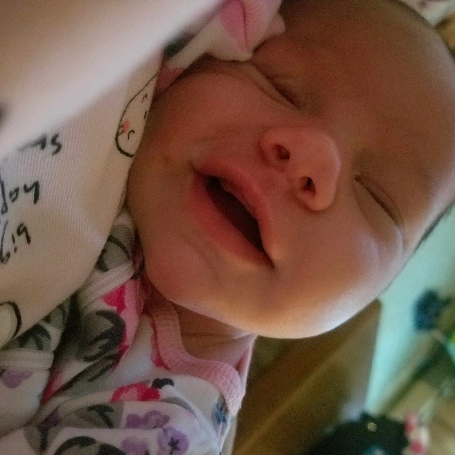 Cerabella is registered to the contest to win money with this photo: baby, cheek, chin, ear, eyebrow, eyelash, facial_expression, finger, forehead, happy, headgear, jaw, lip, mouth, neck, nose, pink, skin, smile, toddler