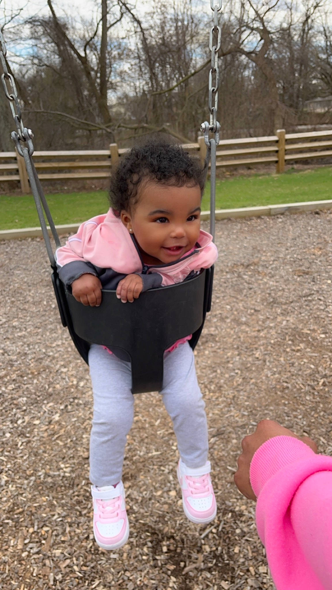 Khalya joined the competition — help win amazing prizes! baby, baby_toddler_clothing, child, city, fun, grass, happy, joy, leisure, outdoor_play_equipment, people_in_nature, person, pink, plant, playground, public_space, recreation, sleeve, smile, swing