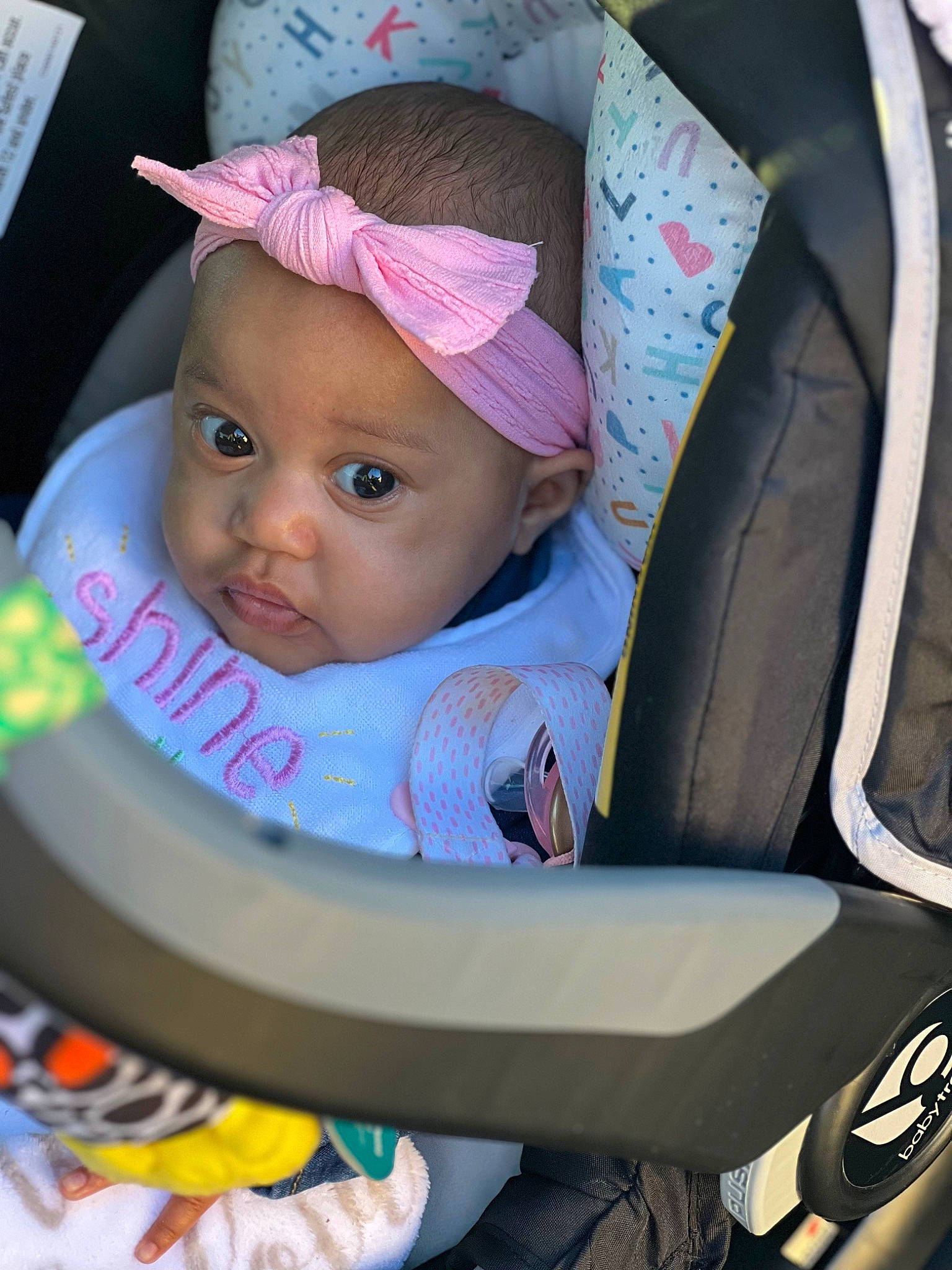 Meilani joined the competition — help win amazing prizes! auto_part, baby, baby_carriage, baby_products, baby_safety, baby_toddler_clothing, cap, car_seat, cheek, child, comfort, electric_blue, facial_expression, fun, hat, headwear, person, pink, product, sitting