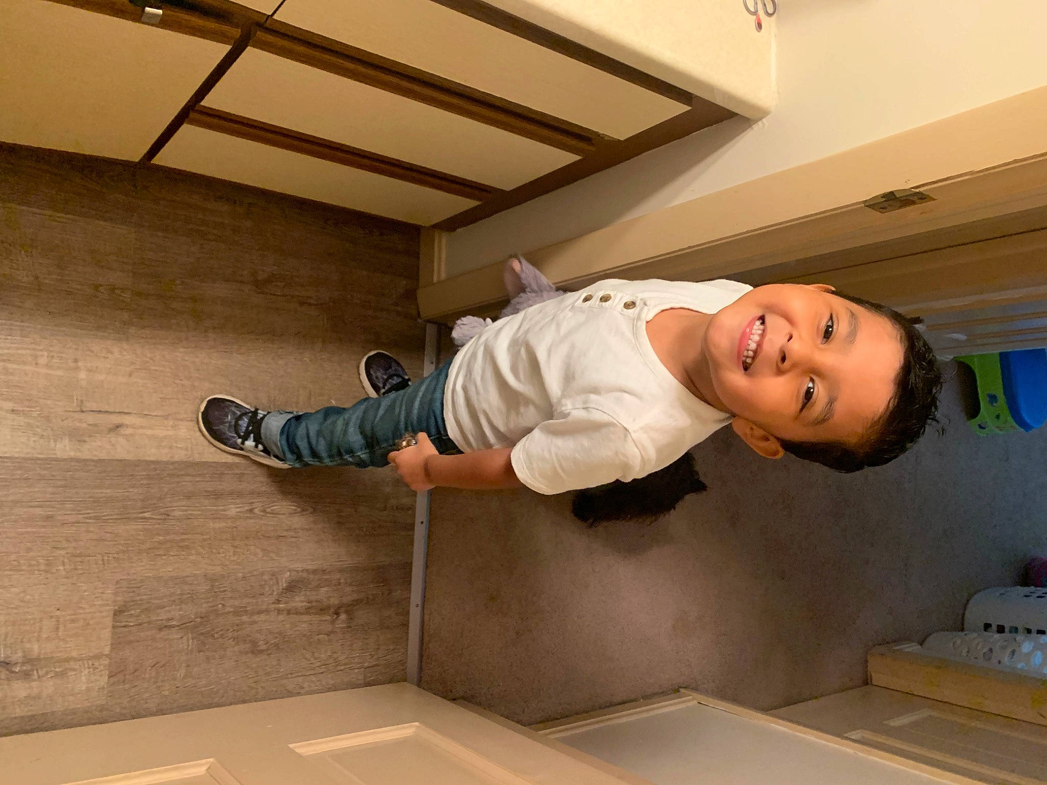 Arian joined the competition — help win amazing prizes! ceiling, child, comfort, elbow, floor, flooring, fun, hardwood, joy, person, plaster, plywood, room, sleeve, smile, space, stairs, t_shirt, toddler, walking_shoe