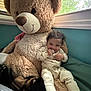 Kaysyn joined the competition — help win amazing prizes! toddler, child, teddy_bear, stuffed_animal, pacifier, smiling, indoor, window, curtain, blanket, pajamas, cozy, cute, happy, hair, face, toy, childhood, relaxing, room