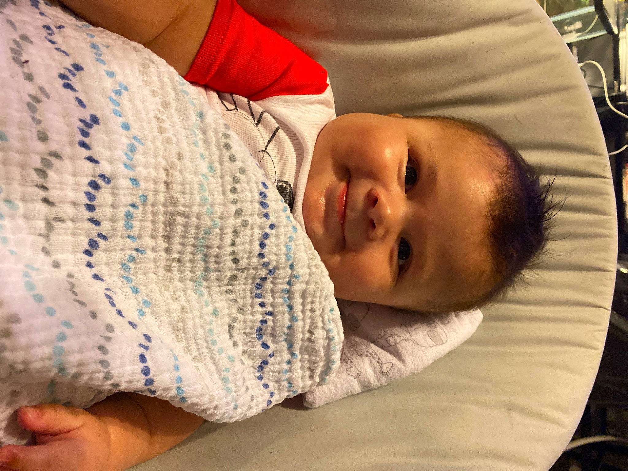 Caspian is registered to the contest to win money with this photo: abdomen, baby, bedding, bedtime, child, comfort, elbow, face, finger, human_body, human_leg, joy, linens, nap, pattern, person, room, sleep, sleeve, thread