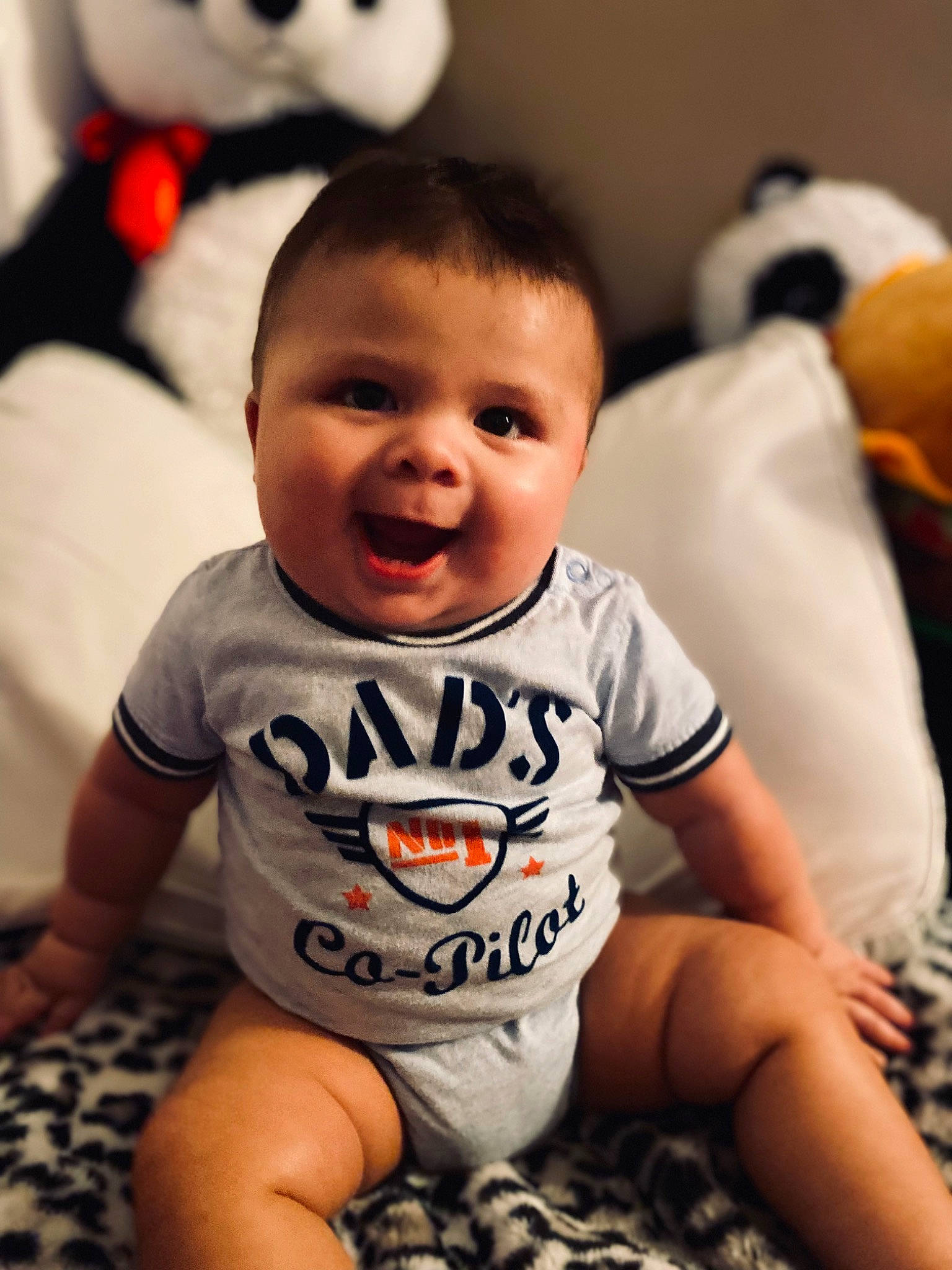 Caspian joined the competition — help win amazing prizes! arm, baby_toddler_clothing, black, cheek, eye, facial_expression, happy, iris, mammal, mouth, nose, orange, organ, person, photograph, skin, sleeve, smile, vertebrate, white