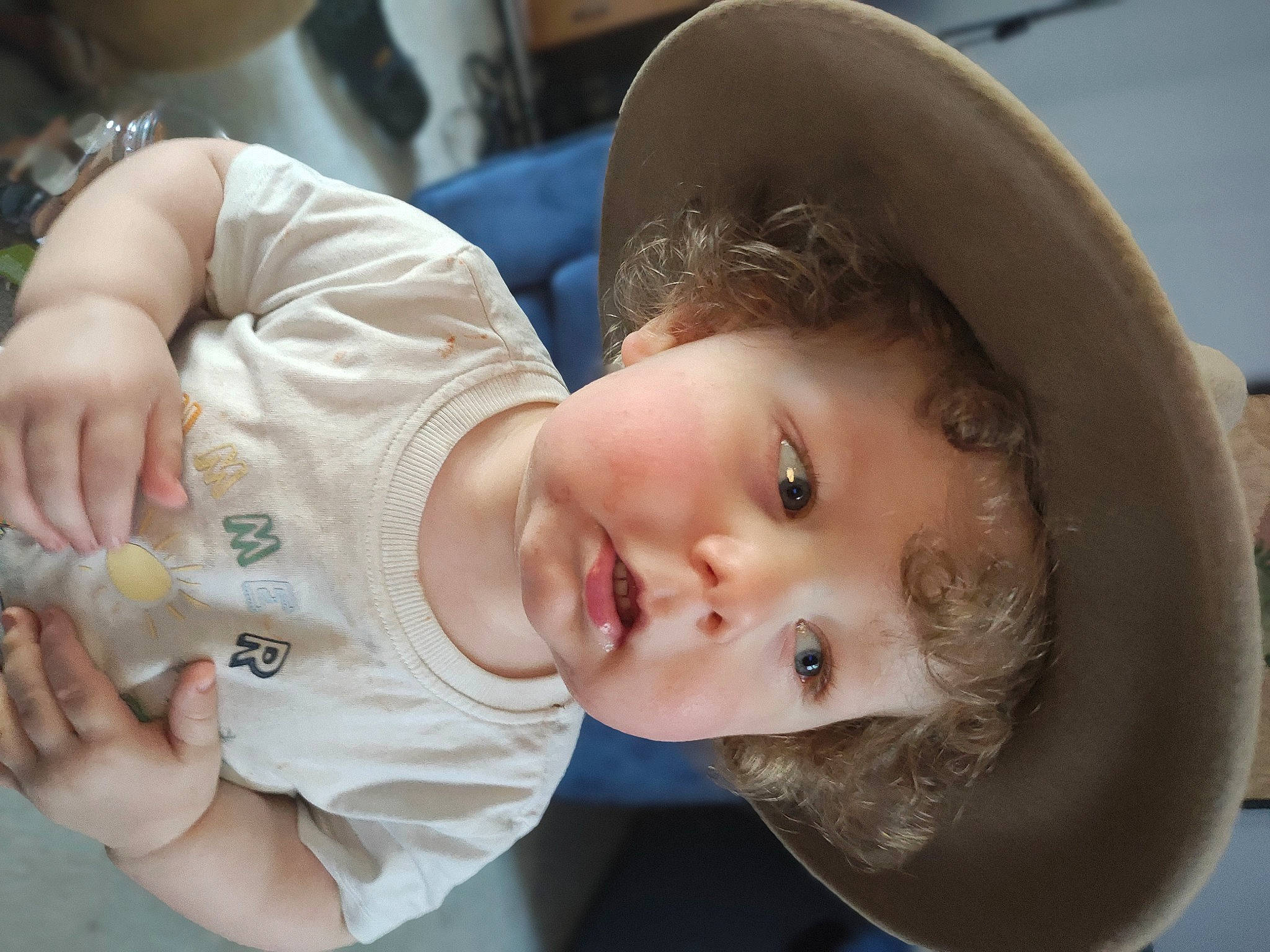 Zayne joined the competition — help win amazing prizes! baby, baby_products, baby_toddler_clothing, cheek, child, drinkware, ear, eyelash, fashion_accessory, fun, happy, hat, headwear, lip, mouth, nose, person, sitting, skin, toddler