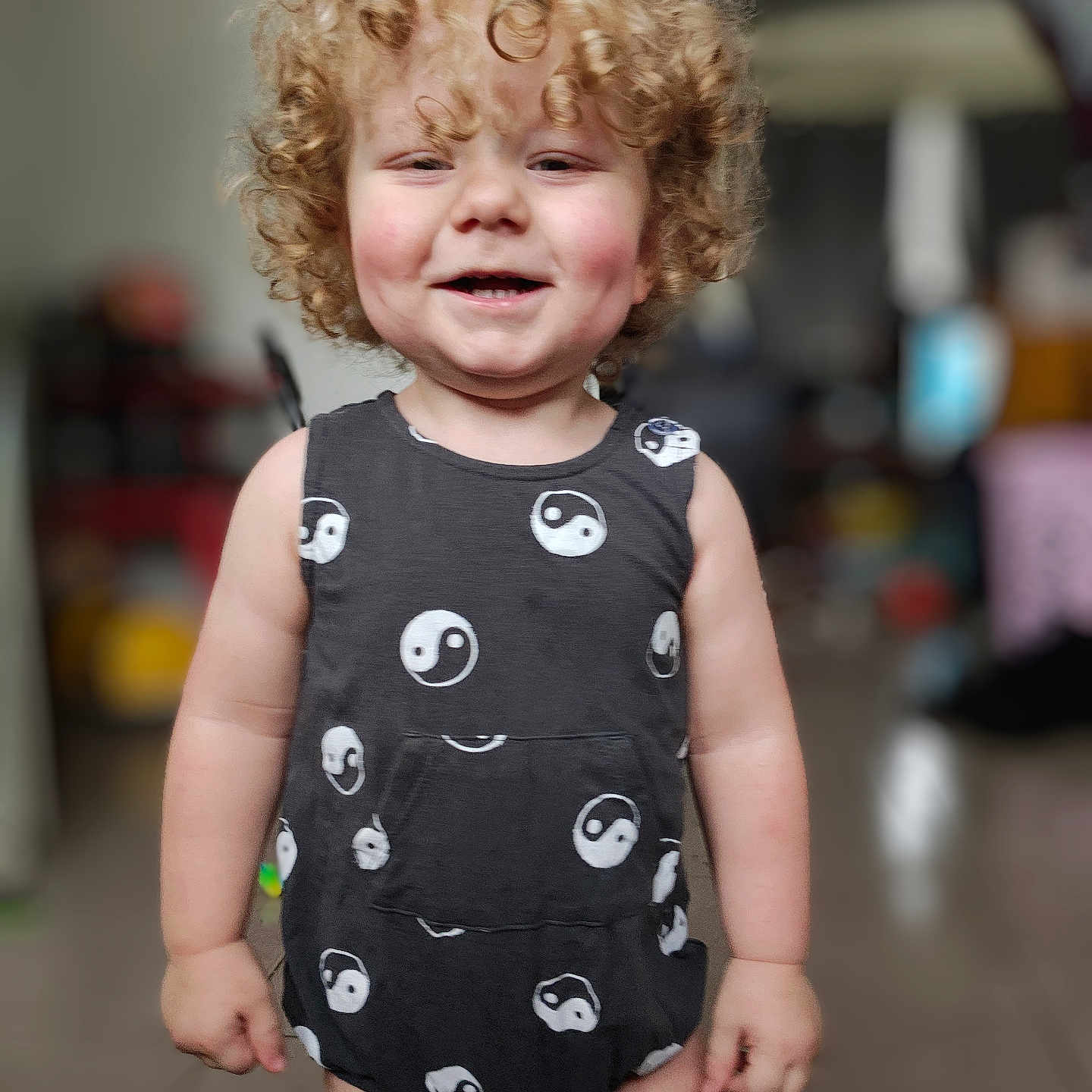 Zayne is registered to the contest to win money with this photo: applique, baby, blonde, bodypart, clothing, crying, dress, face, finger, frown, hair, hand, happy, head, pattern, person, photography, portrait, sad, smile