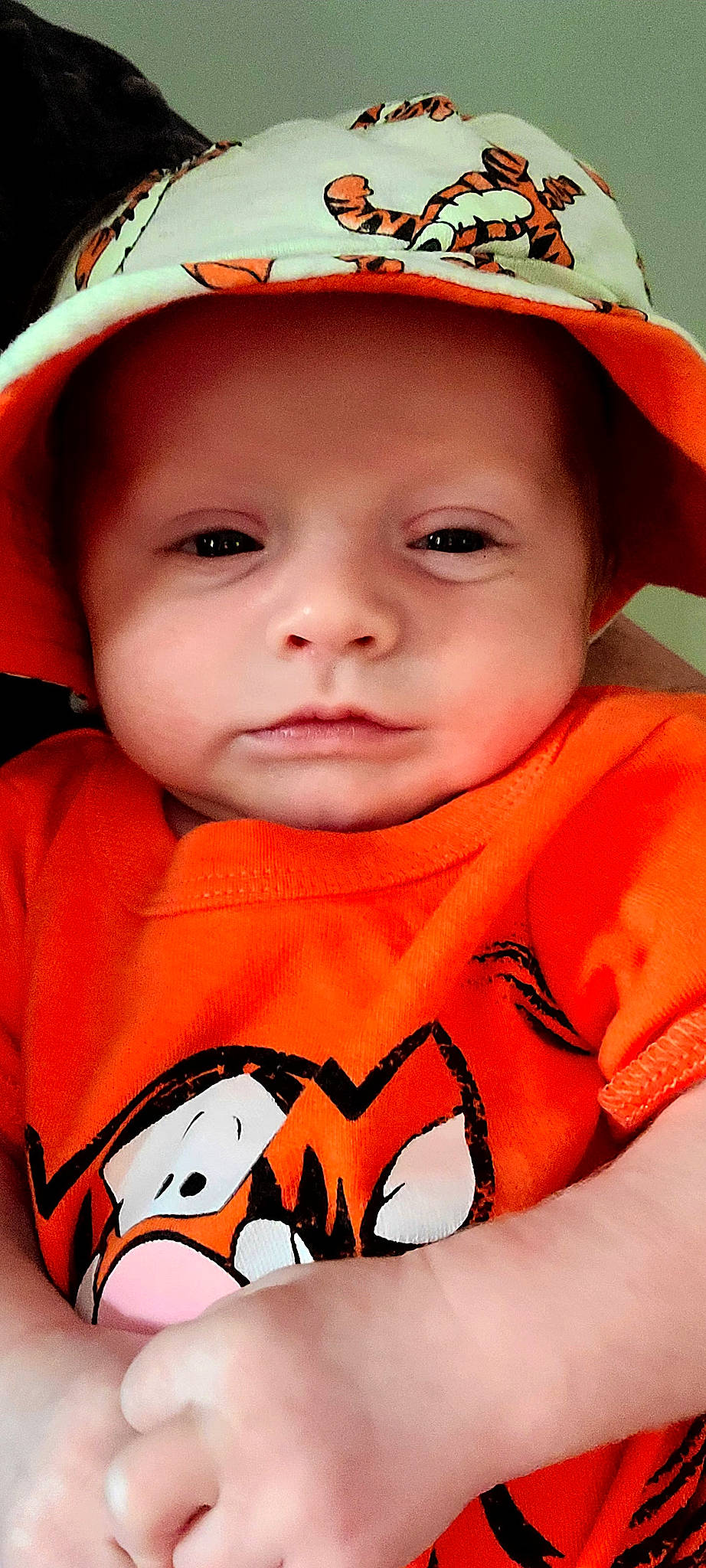 Oaklyn is registered to the contest to win money with this photo: baby, baby_toddler_clothing, cap, cheek, chin, cool, eyebrow, eyelash, happy, hat, headgear, headwear, lip, mouth, nose, orange, person, product, skin, sleeve