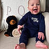 Owen joined the competition — help win amazing prizes! baby, infant, smiling, happy, sitting, plush_toy, teddy_bear, wooden_sign, clothing, navy_blue, blanket, chair, indoor, person, cute, portrait, child, face, feet, hand