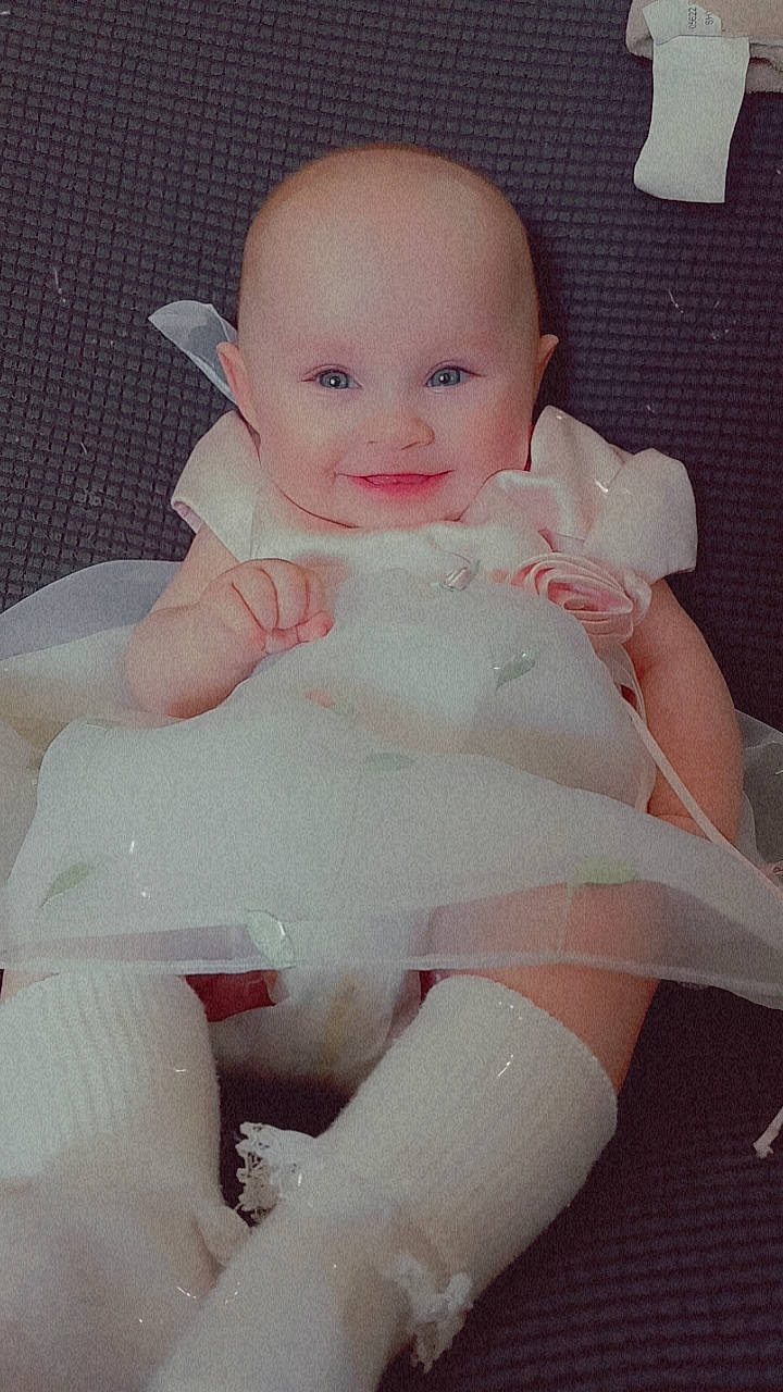 Davina joined the competition — help win amazing prizes! arm, baby, baby_toddler_clothing, cheek, comfort, eye, face, finger, hand, head, human_body, iris, leg, lip, person, pink, skin, sleeve, smile, stomach