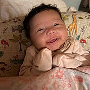 Katalya is registered to the contest to win money with this photo: animal_print, baby, bird, blanket, child, cozy, curly_hair, cute, face, giraffe, happy, indoor, infant, monkey, pillow, portrait, resting, sleepwear, smiling, soft
