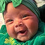 Raelani is registered to the contest to win money with this photo: accessories, baby, babylaughing, bonnet, clothing, face, happy, hat, head, headband, laughing, newborn, person, photography, portrait, smile, towel