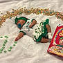 Raelani is registered to the contest to win money with this photo: baby, birthdaycake, bodypart, cake, clothing, cream, dessert, face, finger, food, hand, hat, head, person, photography, portrait, produce, sleeping, sweets, toy