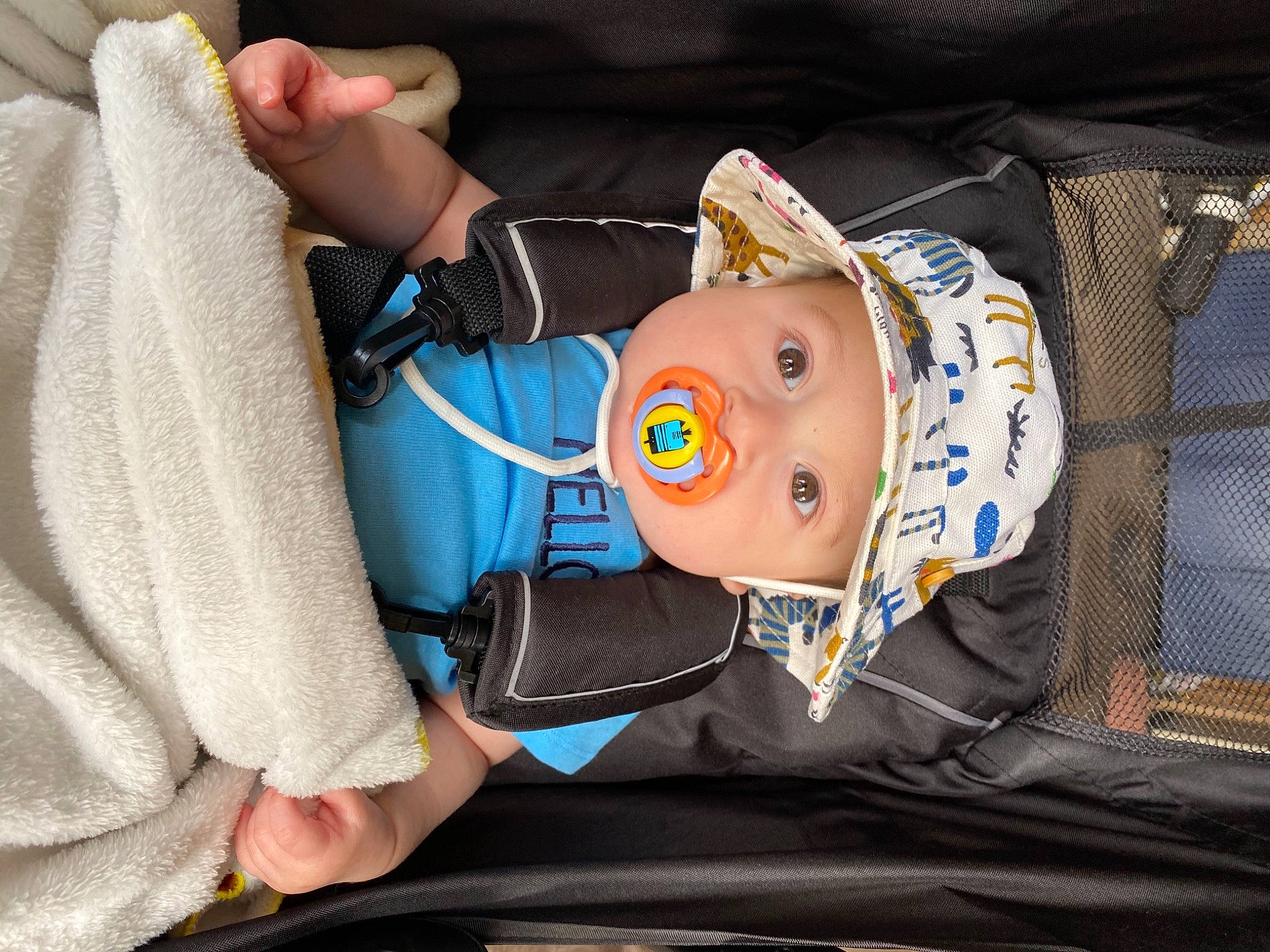Javier joined the competition — help win amazing prizes! auto_part, baby, baby_products, baby_safety, baby_toddler_clothing, child, comfort, electric_blue, finger, fun, hat, headwear, nail, person, personal_protective_equipment, sitting, sleeve, toddler