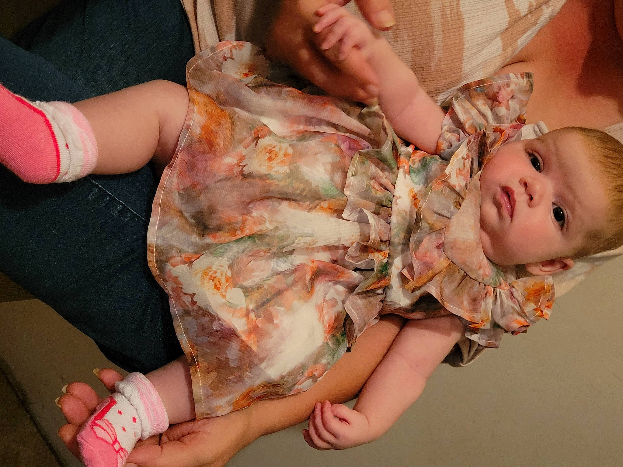 Rylee is registered to the contest to win money with this photo: baby, baby_toddler_clothing, comfort, finger, foot, fun, gesture, hand, happy, human_leg, joint, leg, mouth, nail, pattern, person, pink, skin, thigh, thumb