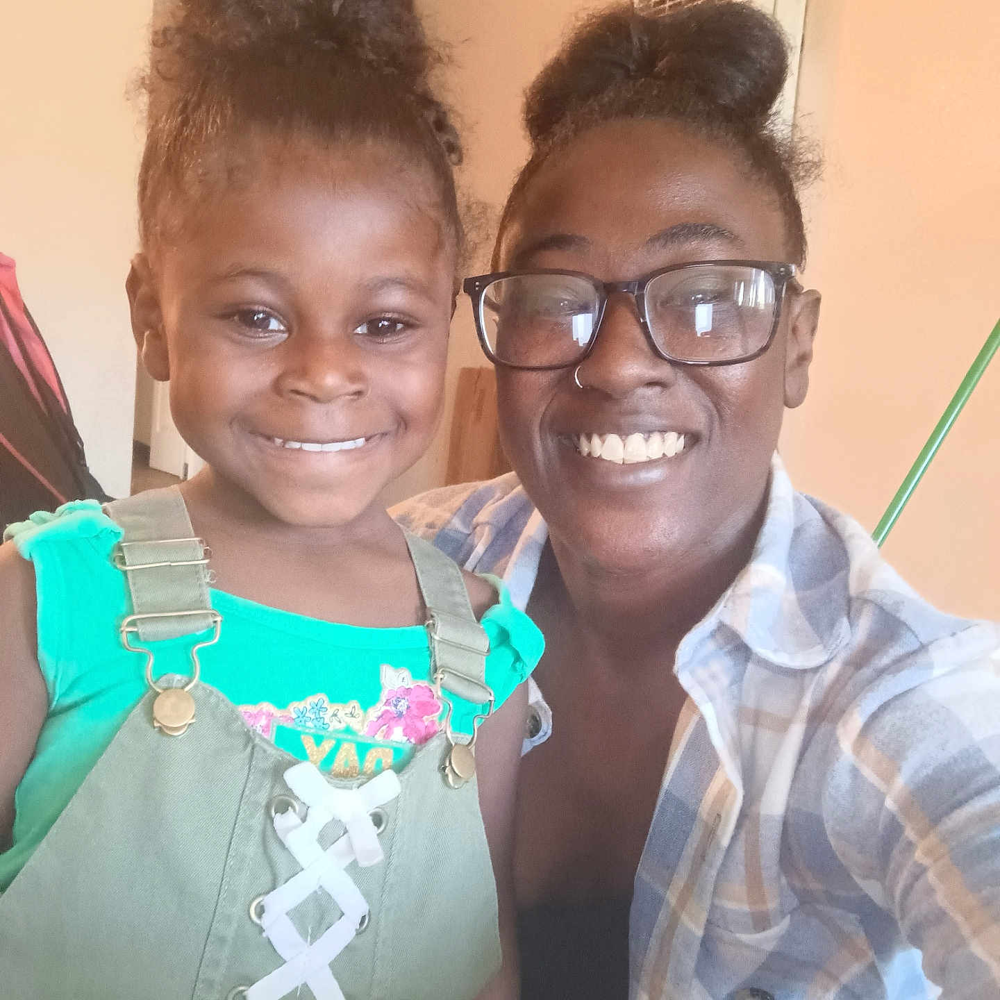 Miracle is registered to the contest to win money with this photo: accessories, blouse, bodypart, child, clothing, face, female, girl, glasses, happy, head, jewelry, mouth, necklace, person, photography, portrait, smile, t_shirt, teeth