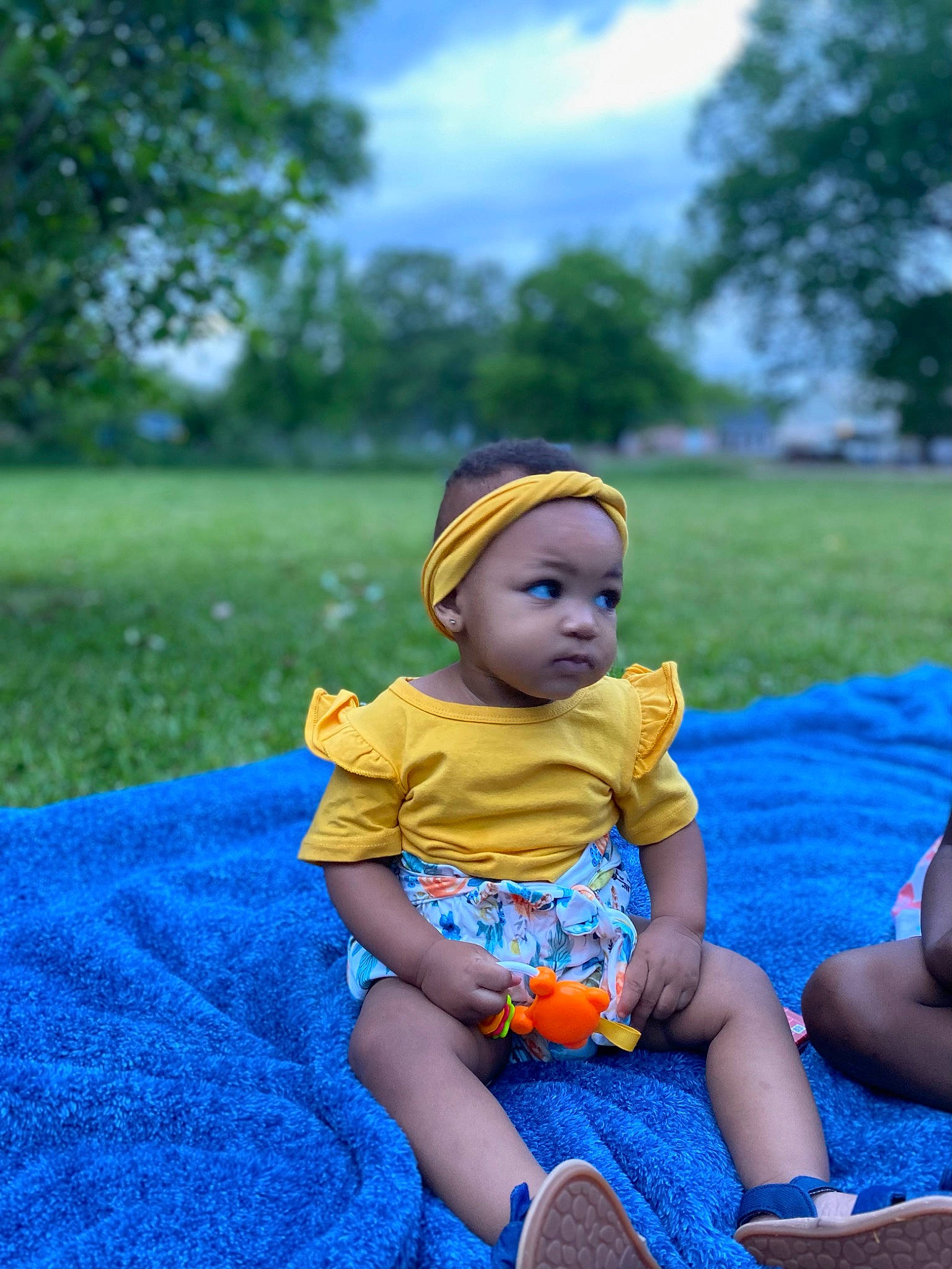 Lauryn joined the competition — help win amazing prizes! aqua, baby, baby_toddler_clothing, blue, cap, cloud, electric_blue, fun, grass, happy, hat, headgear, headwear, leaf, leisure, people_in_nature, person, plant, recreation, sky