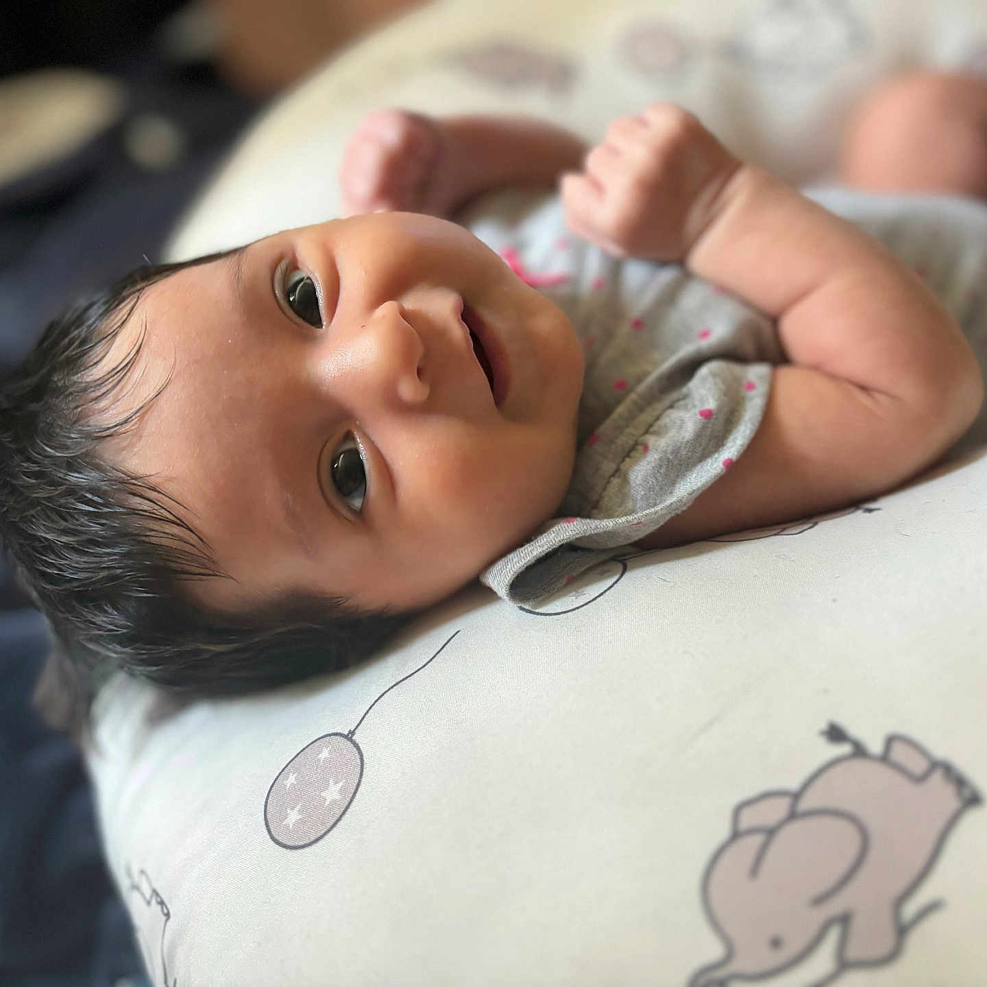 Melina is registered to the contest to win money with this photo: architecture, baby, babylaughing, blanket, bodypart, building, cushion, face, finger, hand, happy, head, homedecor, hospital, newborn, person, photography, portrait, smile, wrist