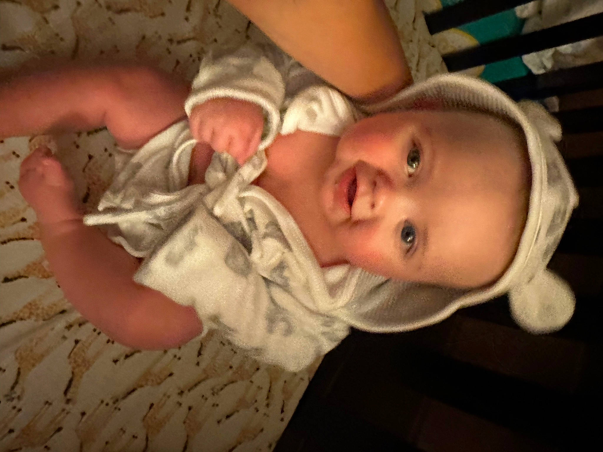 Cameron is registered to the contest to win money with this photo: baby, baby_toddler_clothing, cheek, child, comfort, ear, eyelash, fun, gesture, grass, happy, hat, lip, mouth, nose, person, skin, smile, thumb, toddler