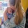Remi joined the competition — help win amazing prizes! baby, woman, indoor, denim_jacket, pacifier, holding, kissing, tender, blond_hair, long_hair, window, curtains, chair, patterned_fabric, floor, natural_light, portrait, closeup, family, love