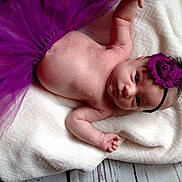 Kaleah joined the competition — help win amazing prizes! beauty, child, flower, girl, hair_accessory, infant, pink, purple, skin, smile