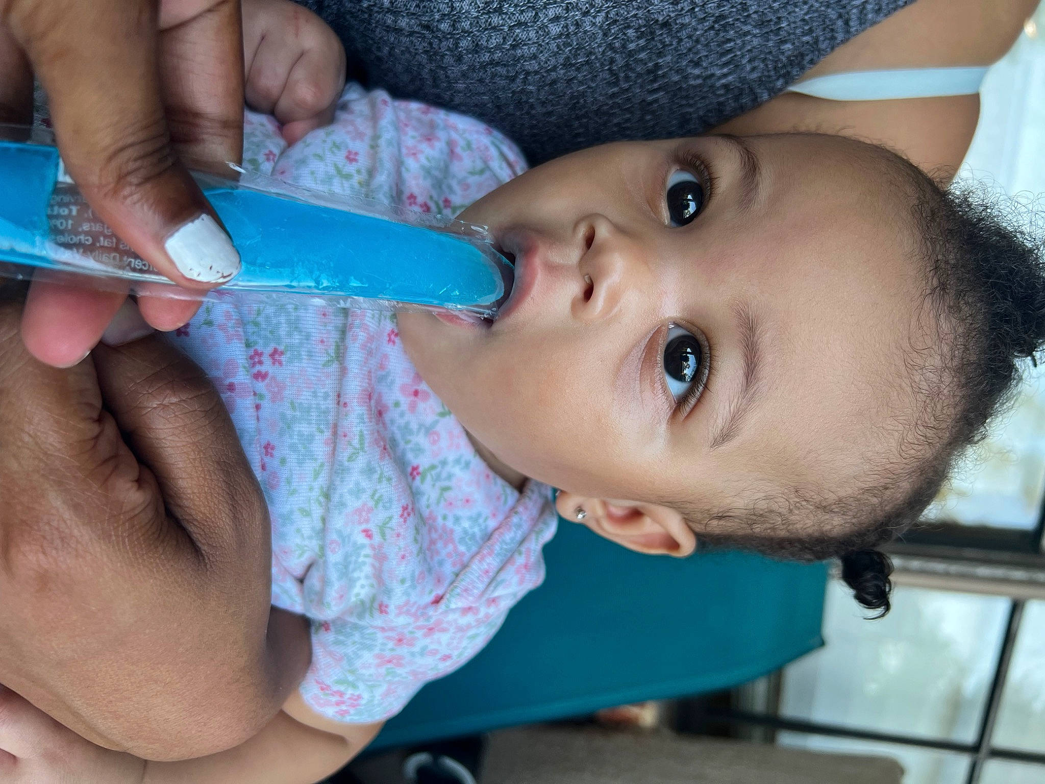 Gia joined the competition — help win amazing prizes! blue, cheek, drinkware, ear, eyebrow, eyelash, finger, food, gesture, hand, iris, lip, nail, nose, person, plastic_bottle, skin, surprise, tableware, thumb