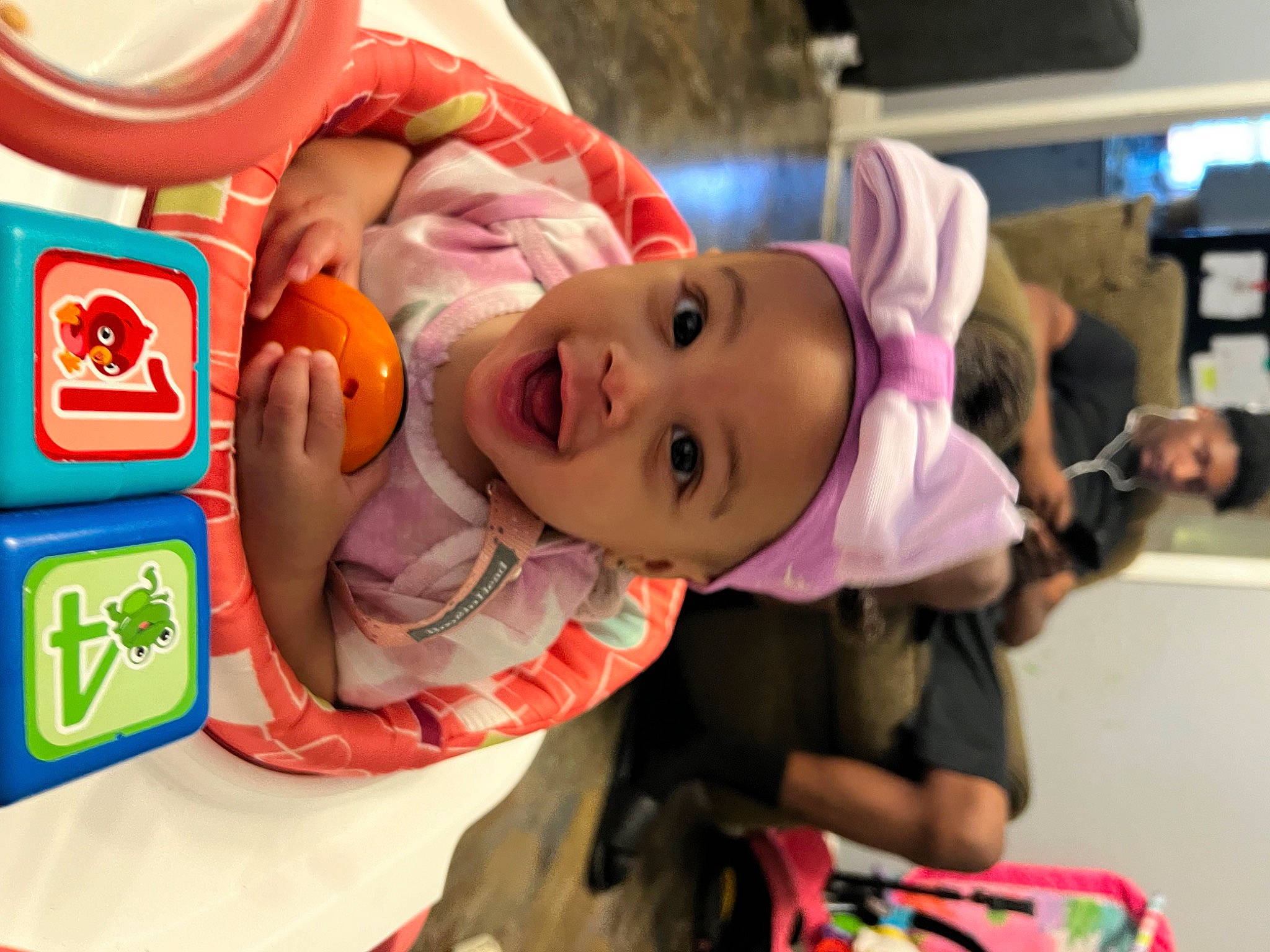 Gia is registered to the contest to win money with this photo: baby, baby_products, baby_toddler_clothing, cheek, child, event, fun, happy, hat, leisure, party, person, play, recreation, room, smile, toddler