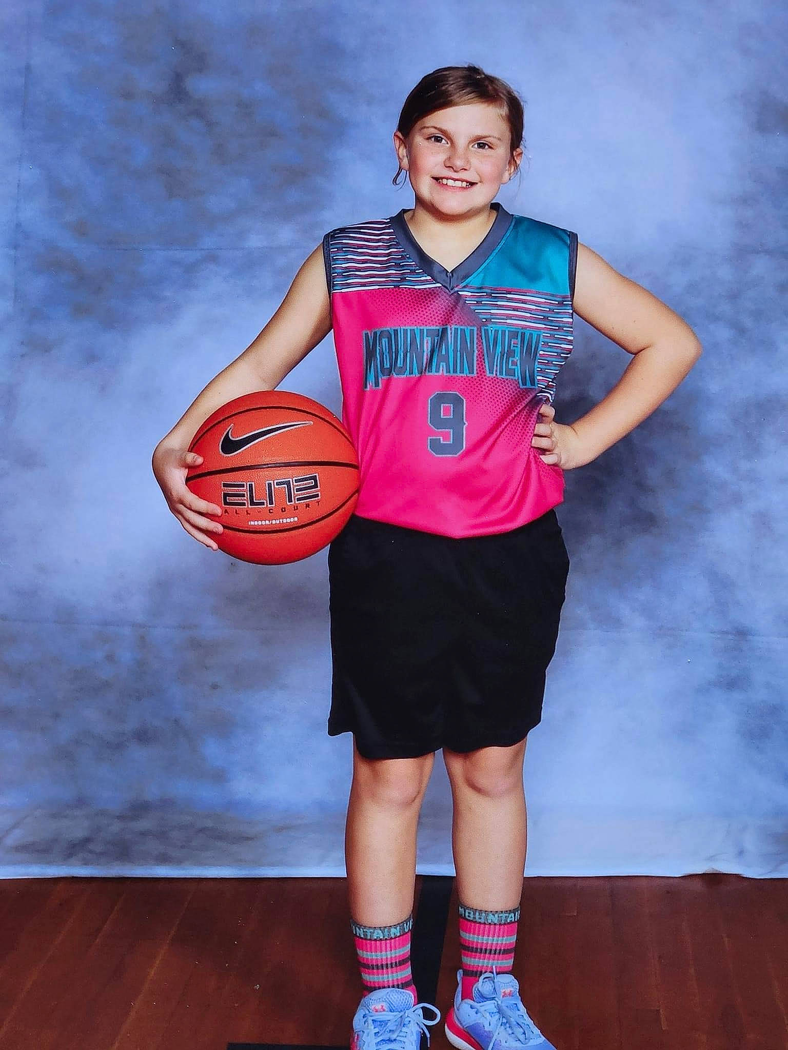 Addyson is registered to the contest to win money with this photo: ball, ball_game, basketball, basketball_court, basketball_moves, basketball_player, competition_event, jersey, joy, knee, person, player, shorts, smile, sneakers, sports_equipment, sports_jersey, sports_uniform, sportswear, tournament