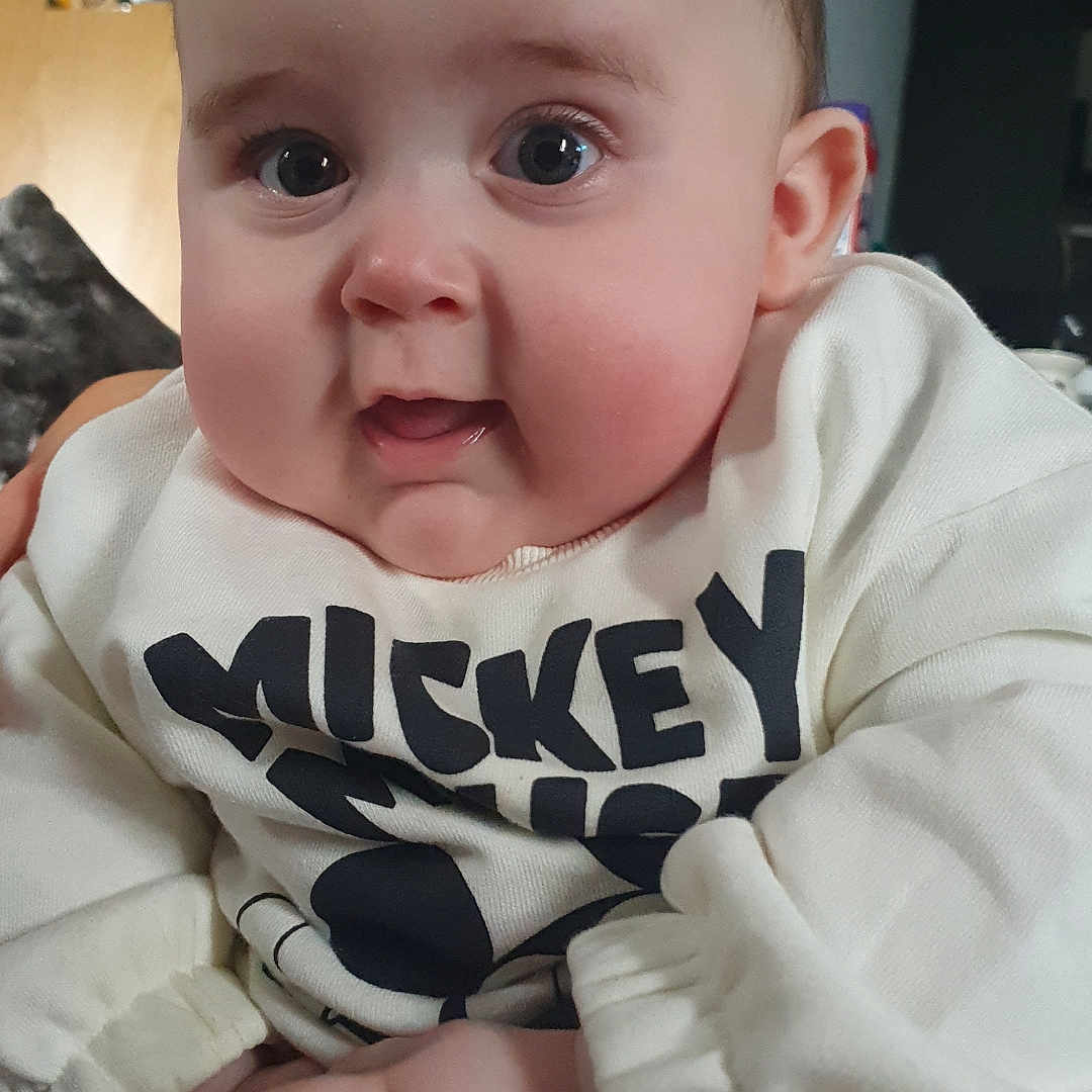 Dawson joined the competition — help win amazing prizes! applique, baby, bodypart, clothing, face, finger, hand, happy, head, knitwear, longsleeve, newborn, person, photography, portrait, sitting, sleeve, smile, sweater, t_shirt