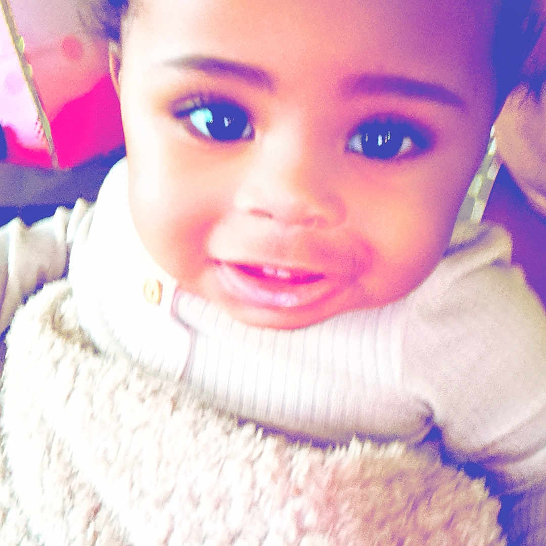 Kamari is registered to the contest to win money with this photo: baby, bodypart, bonnet, clothing, face, finger, frown, hand, happy, hat, head, knitwear, mouth, person, photography, portrait, sad, selfie, smile, sweater
