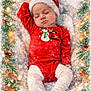 baby, sleeping, christmas, holiday, festive, red_clothing, santa_hat, blanket, cozy, lights, ornaments, decoration, infant, cute, portrait, celebration, winter, child, soft, peaceful
