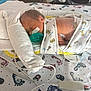 Adalynn is registered to the contest to win money with this photo: newborn, baby, incubator, hospital, medical, pacifier, blanket, swaddled, sleeping, tubes, footprint_pattern, bed, infant, patient, healthcare, monitoring, cute, small, resting, premature